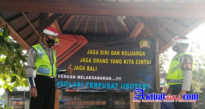 Polres Gianyar Sosialisasikan Isolasi Terpusat Melalui Spanduk di Tempat Strategis