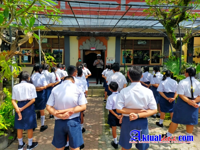 Tertib Berlalulintas dan Himbau Prokes, Giat Sat.Lantas Polres Gianyar di SMPN 5 Sukawati