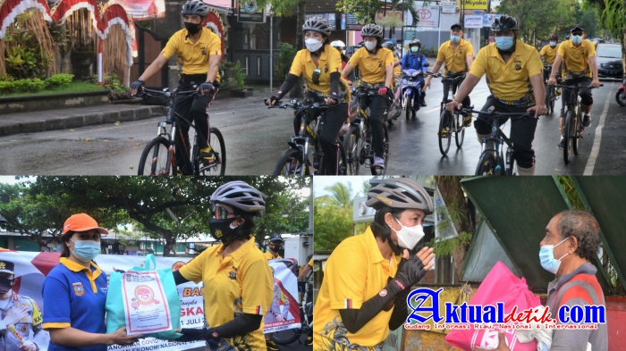 Sambut Hari Bhayangkara Ke-75, Kapolres Karangasem Pimpin Gowes Sambil Bagikan Sembako