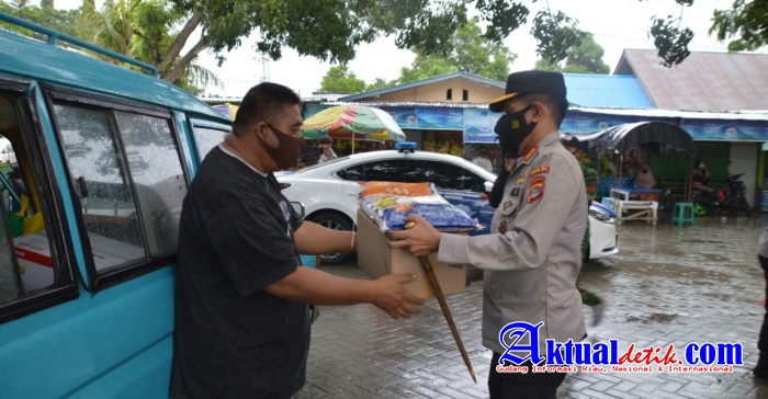 Aksi Polri Peduli Dampak Covid 19, Polda Gorontalo Salurkan 1000 Paket Sembako