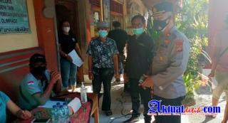 Polsek Gianyar Terjunkan Personil Dalam Melaksanakan Pengaman Kegiatan Massal Vaksinasi Covid -19