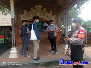 Unit Samapta Polsek Mengwi Pantau Pelaksanaan Prokes dan PPKM Level-3 di Obyek Wisata Taman Ayun
