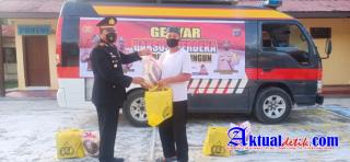 Kapolsek Perdagangan Sampaikan Gebyar Bansos Merdeka