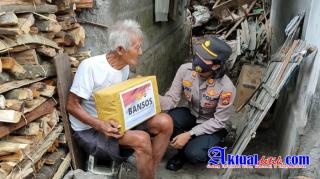 Polri Peduli, Kapolsek Dawan Pimpin Giat Pembagian Sembako dan Nasi Bungkus Untuk Warga