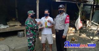 Sinergitas Bhabinkamtibmas dan Bhabinsa Kabupaten Karangasem Salurkan Sembako Kepada Masyarakat